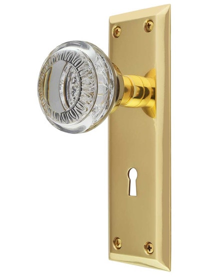 New York Mortise-Lock Set with Ovolo Crystal-Glass Knobs and Keyhole in Polished Brass.